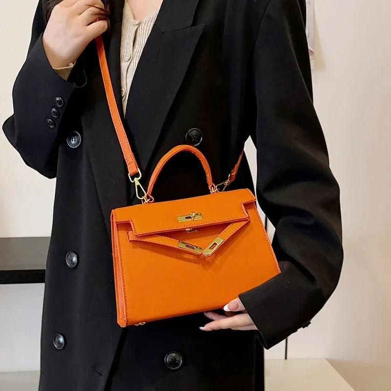 Luxury Leather Mini Bag | Structured Orange Design With Gold Hardware