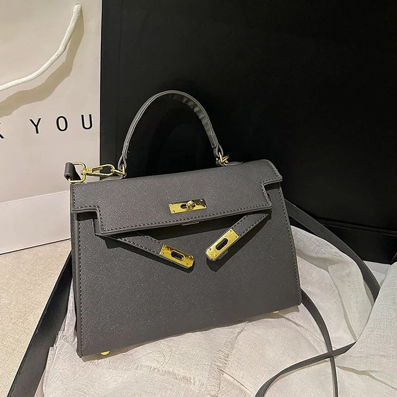 Luxury Leather Mini Bag | Structured Orange Design With Gold Hardware