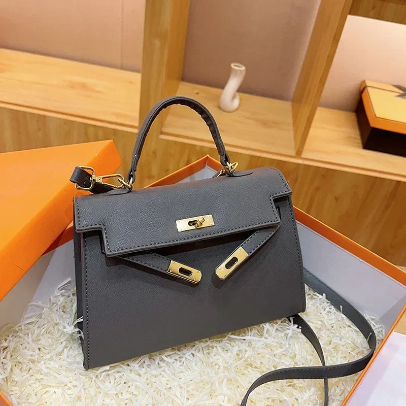 Luxury Leather Mini Bag | Structured Orange Design With Gold Hardware