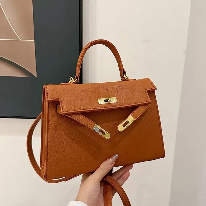 Luxury Leather Mini Bag | Structured Orange Design With Gold Hardware