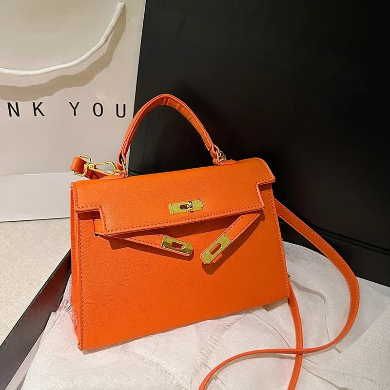 Luxury Leather Mini Bag | Structured Orange Design With Gold Hardware
